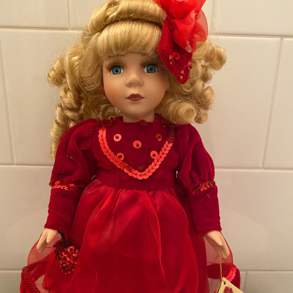 Beautifully Dressed Porcelain Doll
